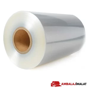 Karton göbeğe sarılmış şeffaf POF shrink film bobininin yakın görünümü.